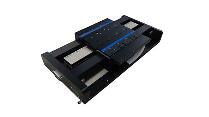 The PIglide AT3 series of stages are linear servo motor driven with fully preloaded air bearings and an integral optical linear encoder. The combination of these non-contact components results in a frictionless motion platform that offers the highest performance, quality, and life. These stages are ideally suited for many high precision applications, such as metrology, photonics alignment, semiconductor inspection, flat panel display, laser machining, and precision scanning applications. The non-contact design also makes these stages ideal for cleanroom applications. A high-force linear motor can drive the stage to top speed within a few milliseconds, and the large capacity bearings can support payloads up to 35 kg. The laterally opposed, actively preloaded air bearing design in this model will support normal, vertical, and side-mounted orientations. 