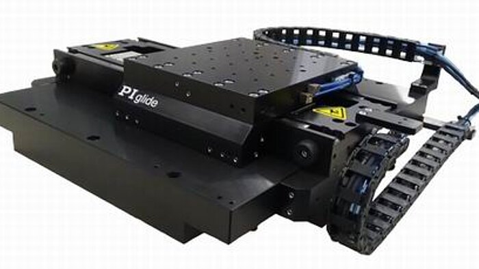 The PIglide IS planar XY air-bearing stage is a low profile, high precision alternative to stacked XY stages. The fully preloaded air bearing puck floats in both X and Y directions on a common base, providing smooth, frictionless motion. Ideal for inspection, laser marking, microscopy, scanning, and other precision motion applications. The efficient, compact design saves space in tight machine designs. Ironless linear motors provide smooth motion with no cogging or attractive forces. Optical linear encoders provide position feedback information down to 1nm, depending on interpolation.   The PIglide IS can be coupled with a variety of industry-leading digital controls and drives that offer advanced algorithms to improve dynamic performance and error compensation and a wide suite of software development tools. 